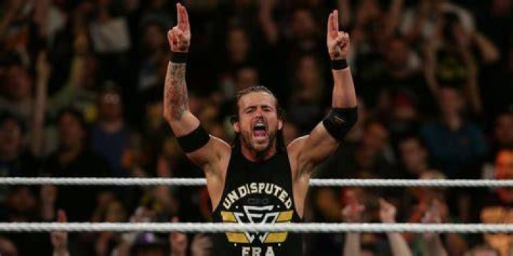 Adam Cole Bay Bay pose