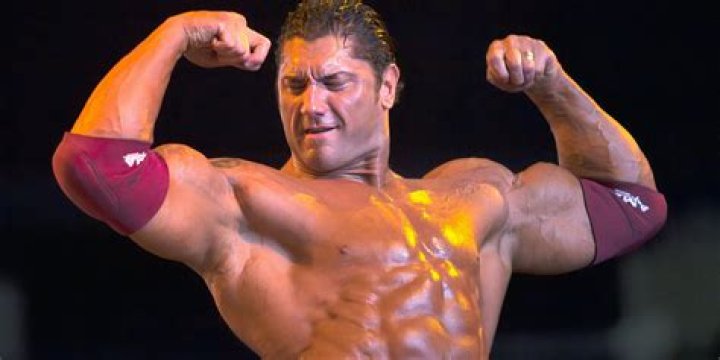 Batista flexing in ring
