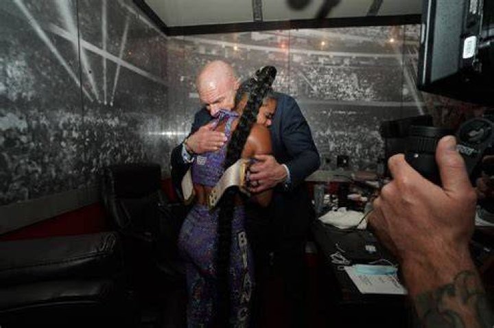 Bianca is hugging HHH
