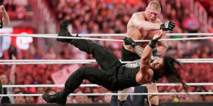 Brock Lesnar Clobbers Roman Reigns