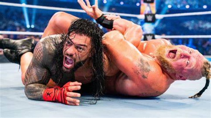 Brock Lesnar Roman Reigns Tug Of War