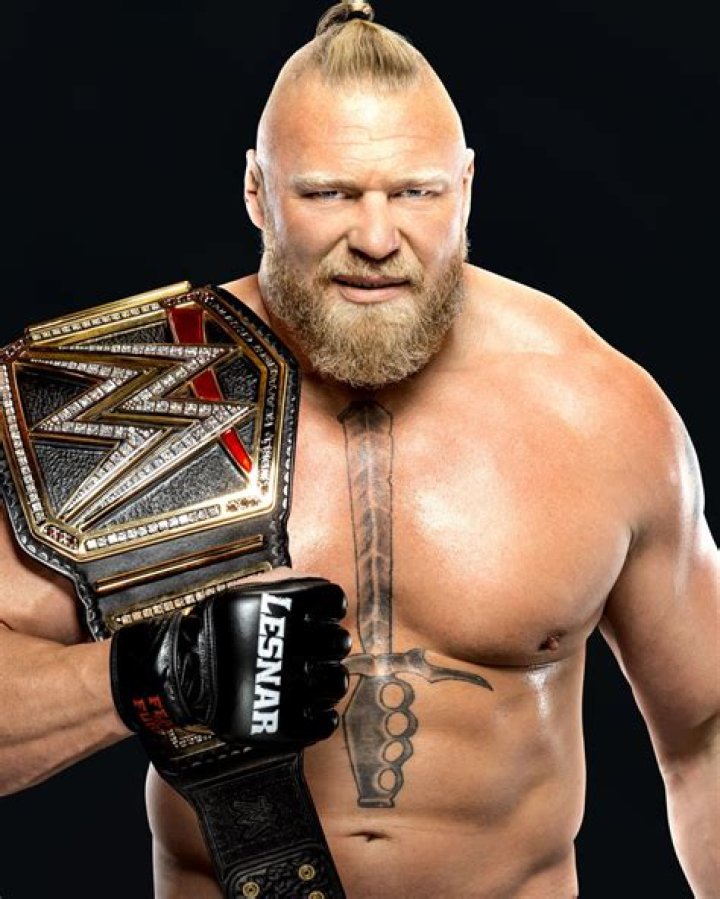 Brock Lesnar WWE Champion and Paul Heyman 2002 Cropped