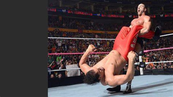 Cesaro with Big Swing on Great Khali.