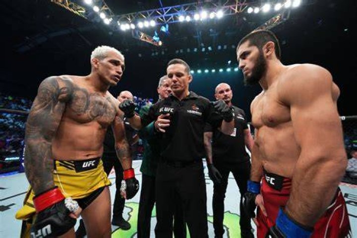 Charles Oliveira Points Toward the Fans