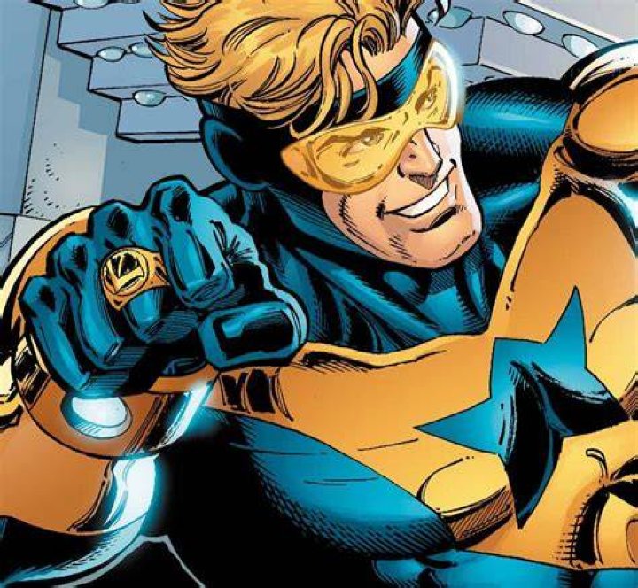 David Spade as Booster Gold in DC Extended Universe (Live Action Shared Universe)