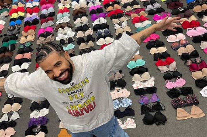 Drake displays hundreds of bras fans have thrown at him on 'It's All a