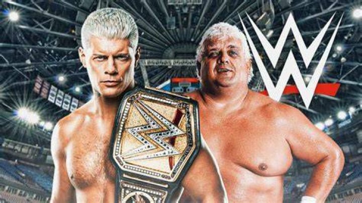 Dusty Rhodes points to his Bionic Elbow.