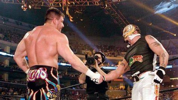 Eddie Guerrero talking to Rey Mysterio's son Dominick