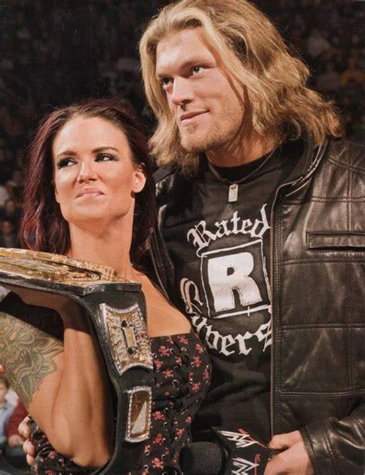Edge and Lita celebrates his first WWE Championship win