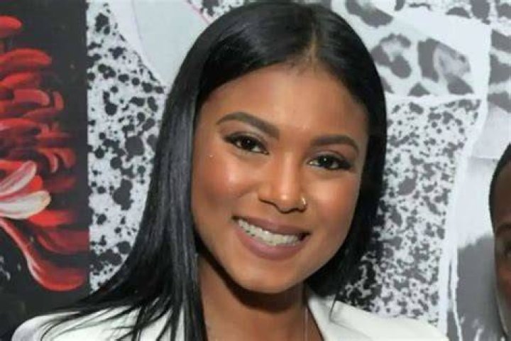 Eniko Hart shows off post baby body in an electric orange set nine days