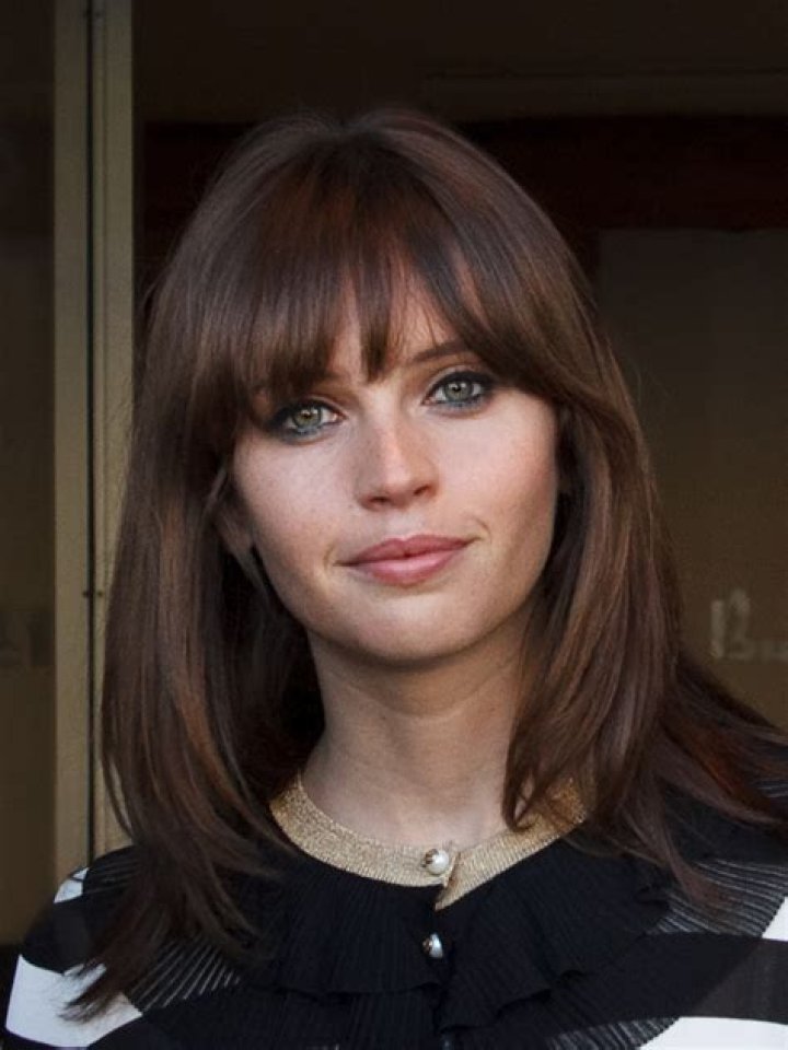 Felicity Jones as Detective Tania Johnson in Rush Hour (2008-2017)