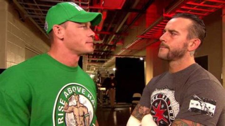 Former WWE Referee Says John Cena & CM Punk Could Be Coaxed Back To Wrestling Under Certain Condition