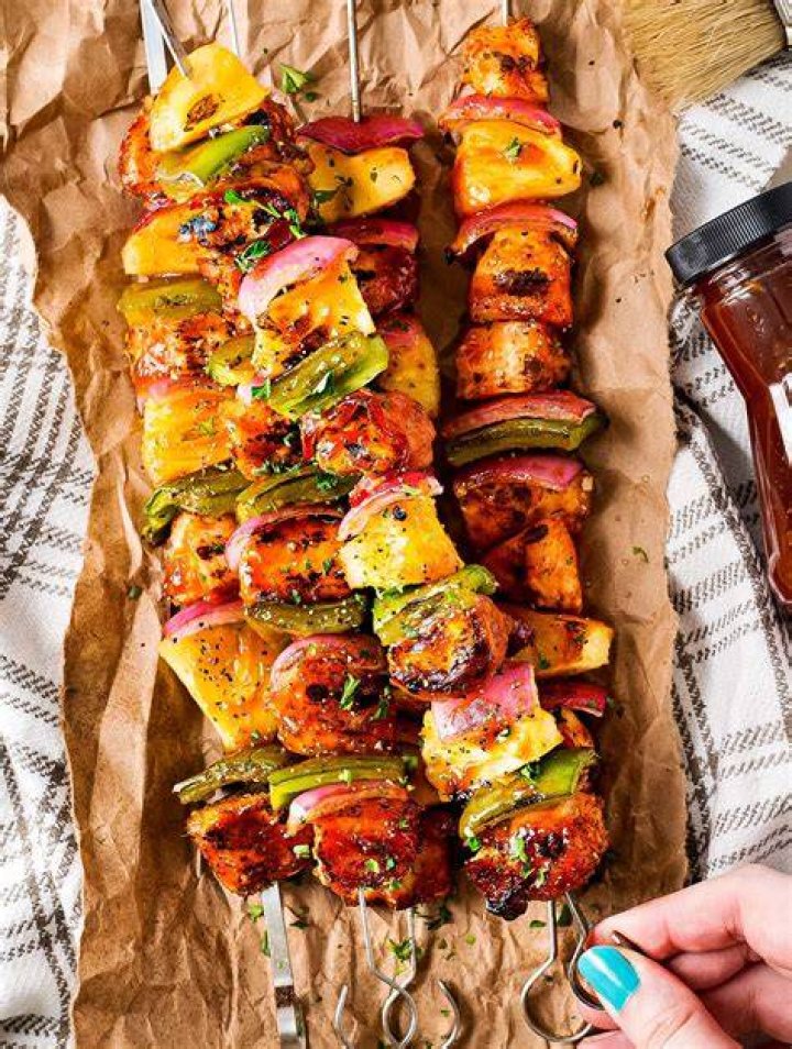 Grilling kabobs on a Solo Stove Ranger Cast Iron Grill Top
