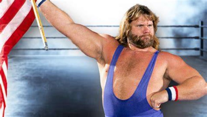 Hacksaw Jim Duggan with his 2x4