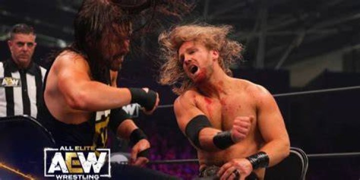 Hangman Page fights Adam Cole 