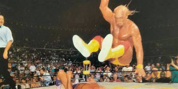 Hulk Hogan hitting a Leg Drop on Triple H.