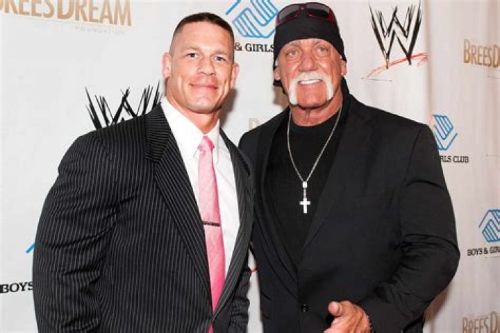 Hulk Hogan puts John Cena in a headlock