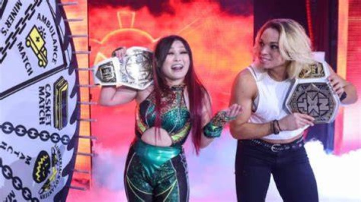 Io Shirai and Zoey Stark as tag team champions