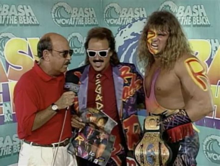 Jimmy Hart with The Renegade and Mean Gene Okerlund in WCW