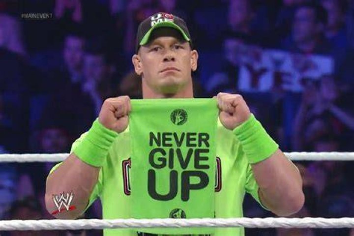 john cena holding a never give up towel in wwe 2k24