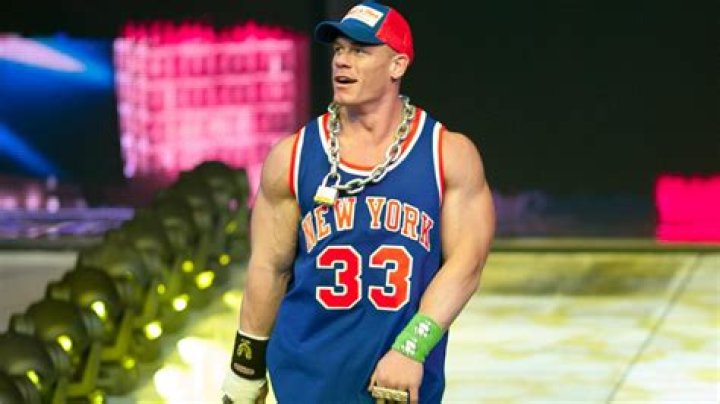 John Cena wearing a Knicks jersey.