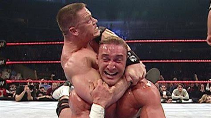 John Cena with an STF on Wade Barrett. 