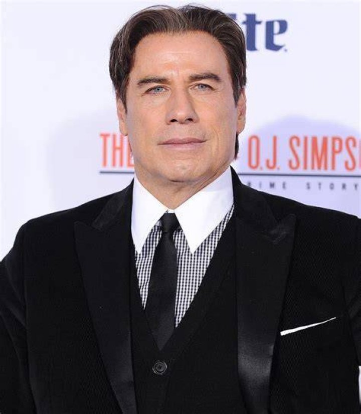 John Travolta as Howard Saint in The punisher (earth-20437)