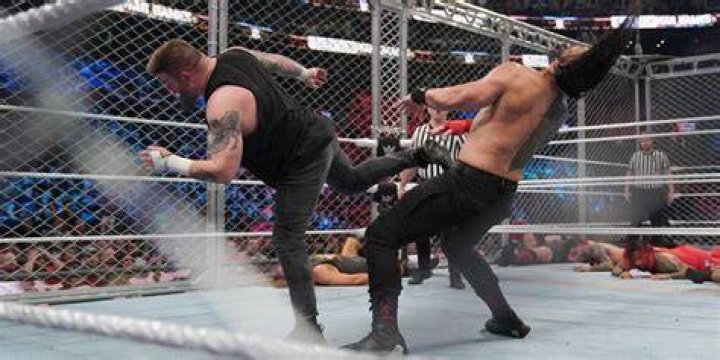 Kevin Owens fights Roman Reigns at WarGames 