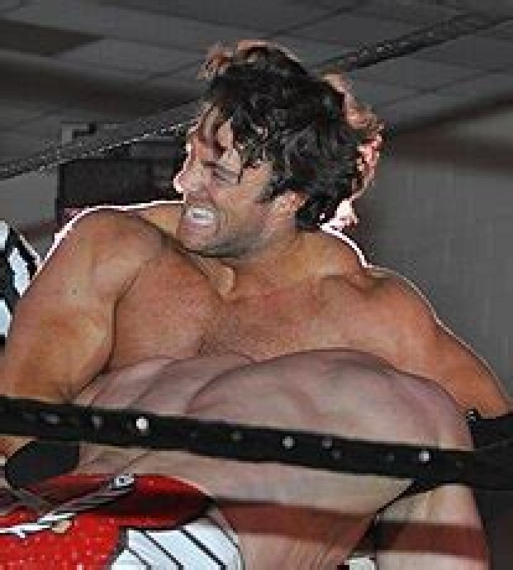 LA Knight as Slate Randall in NXT with Baron Corbin
