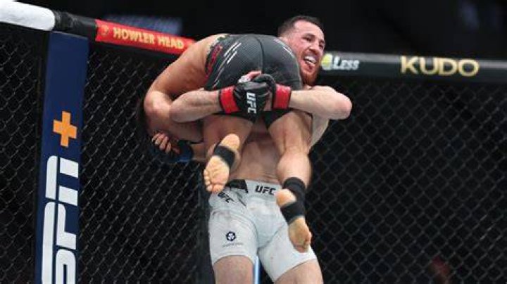 Merab Dvalishvili punches Henry Cejudo at UFC 298