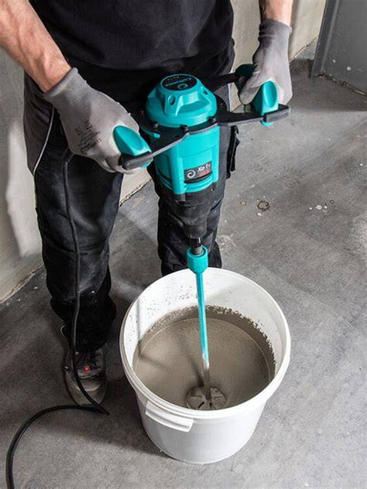 mixing compound in a bucket