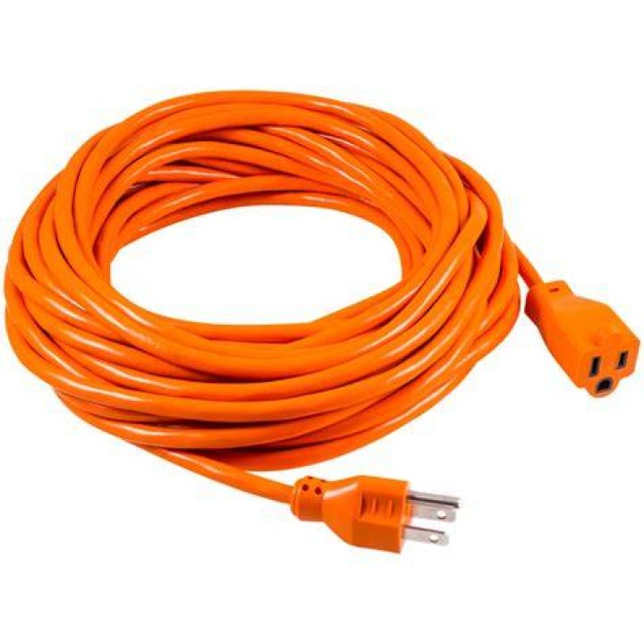 orange Extension Cord on a plywood floor