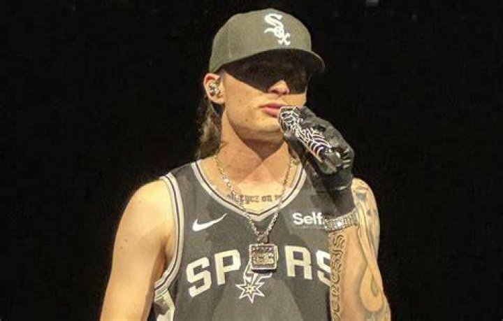 Peso Pluma rocks a Wembanyama Spurs jersey at his soldout concert