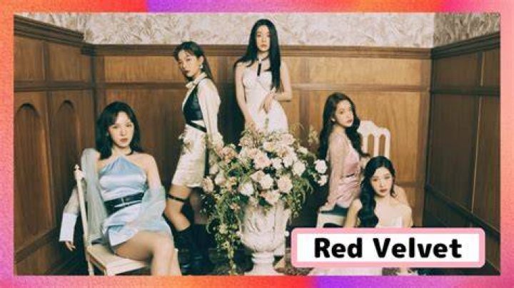Red Velvet posing in an AEW ring.