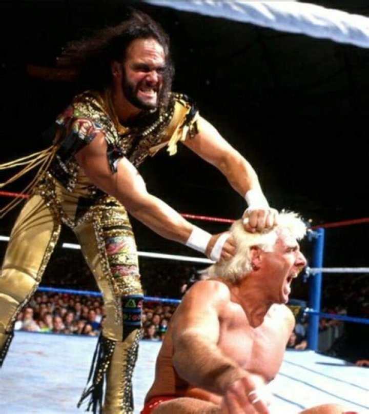 Ric Flair defeats Randy Savage to win WWE Title