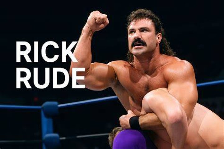 Rick Rude with a chinlock on Ricky Steamboat. 