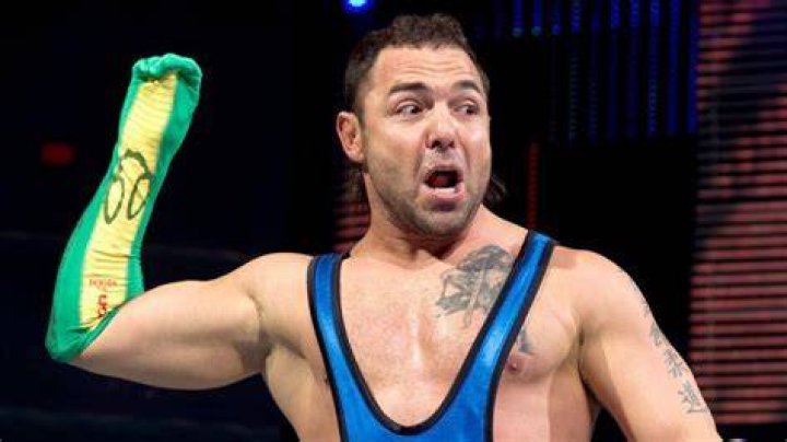 Santino Marella on the ring apron