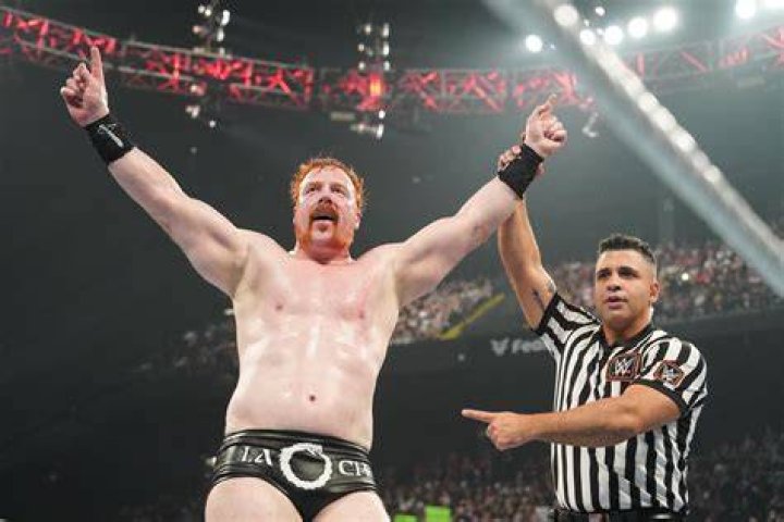 Sheamus clubs Rezar
