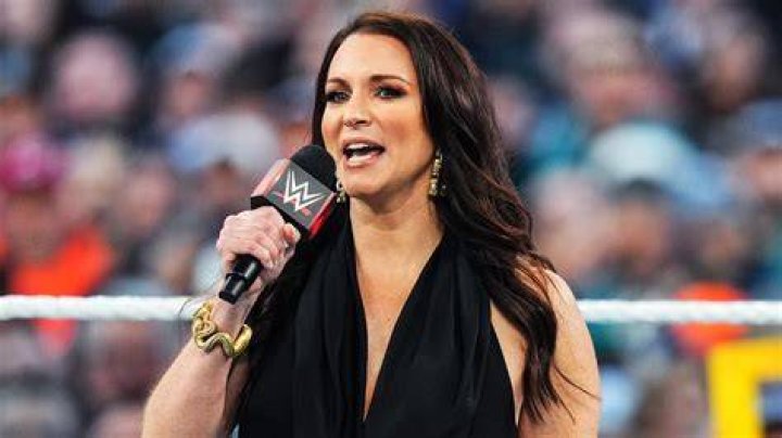 Stephanie McMahon covered in champagne 