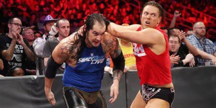 The Miz throws Baron Corbin into the post