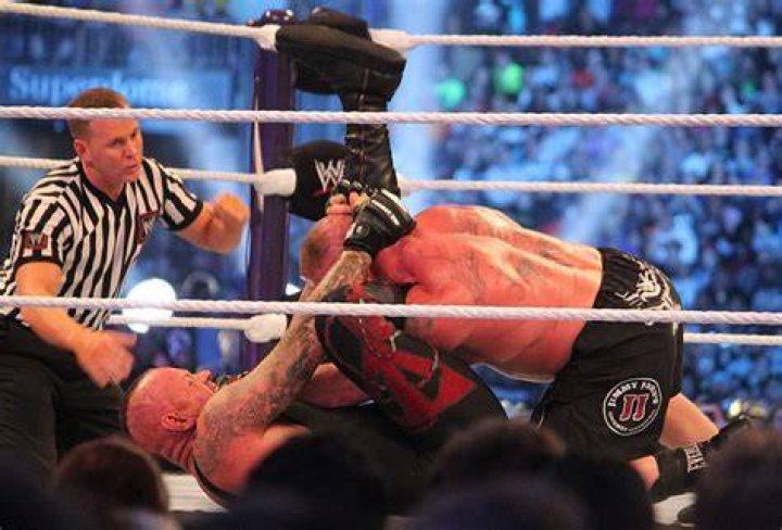 The Undertaker applies Hell's Gate