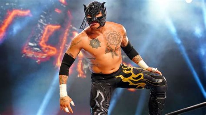 TNA wrestler Rey Fenix with and without a mask