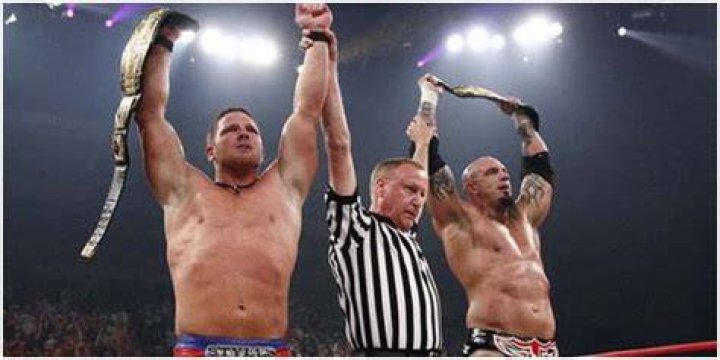 Tomko and AJ Styles as Champions