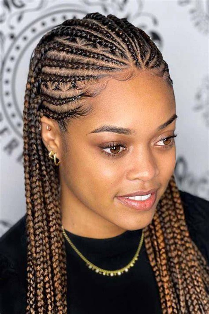 Tribal braids with box braids and beads on the ends Ghana Braids