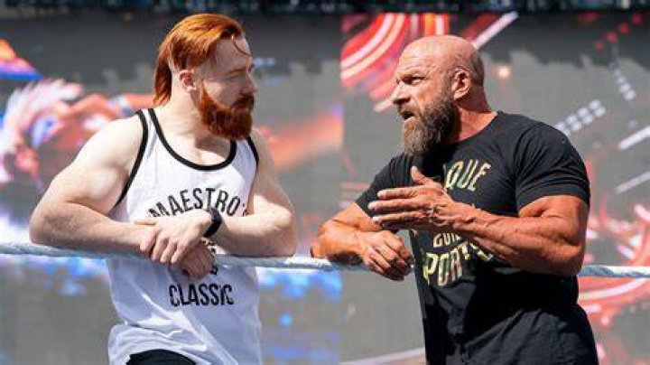 Triple H takes down Sheamus at WrestleMania 26