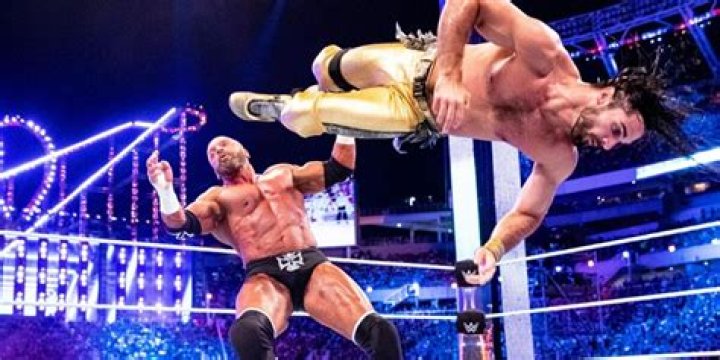 Triple H with Seth Rollins and Randy Orton in WWE