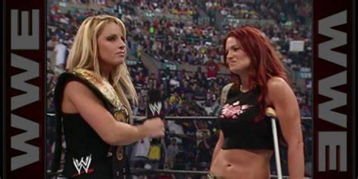 trish stratus saves lita from the fans