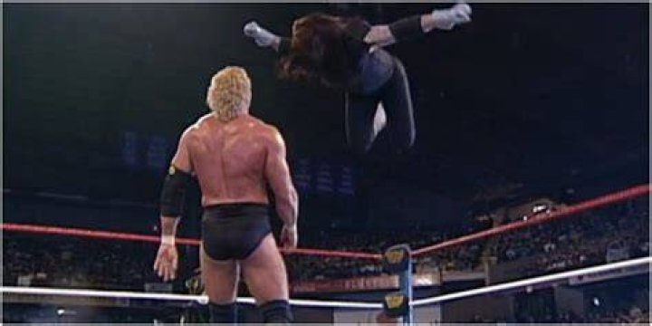 undertaker jumping clothesline