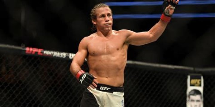 Urijah Faber celebrates a UFC win
