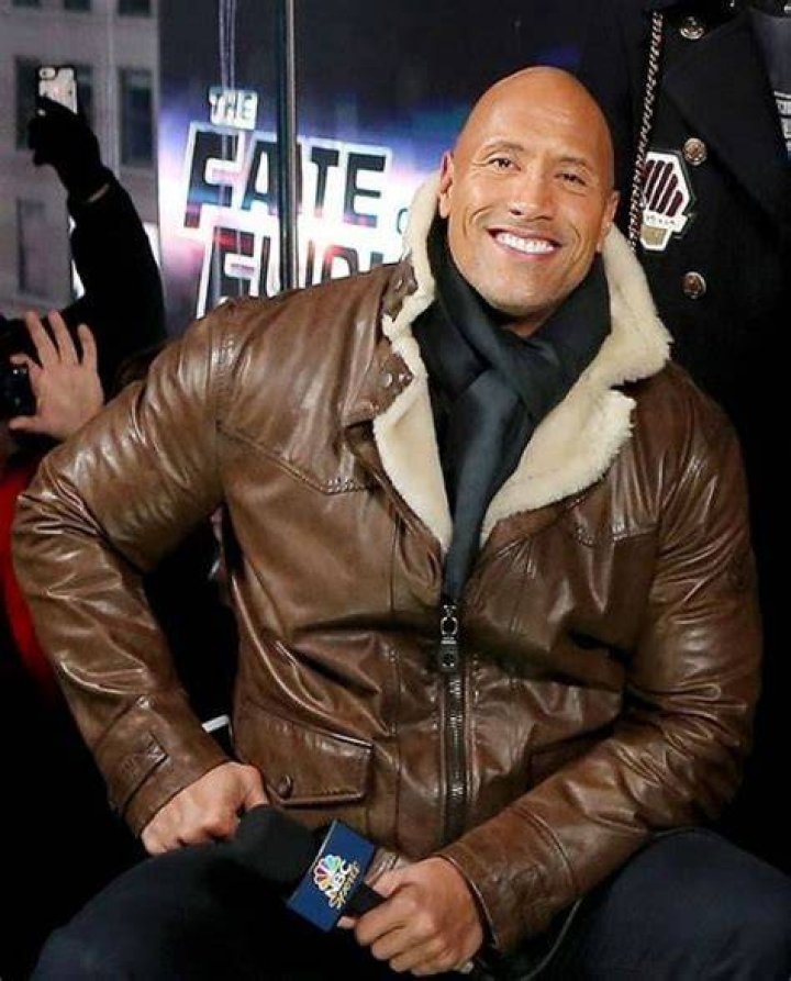 WATCH: Dwayne Johnson’s Iconic Jacket Makes Female WWE Star ‘Sweat’ Hard During
25 Years of The Rock Celebration
